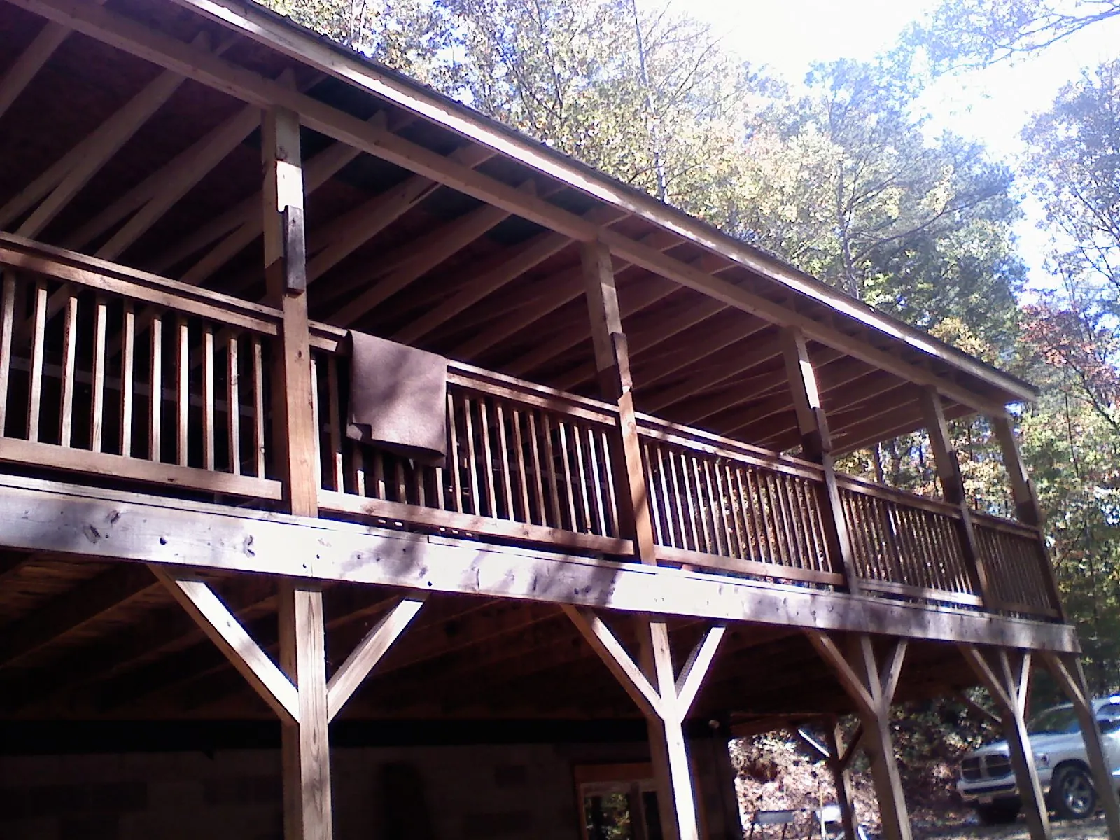 Timber framing under a new elevated porch and deck — Roof Leak Repair in Hot Sulphur Springs by Roofing Brothers